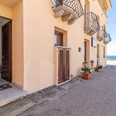 Casa Sulla Scogliera Isola Rossa Apartment ภายนอก รูปภาพ