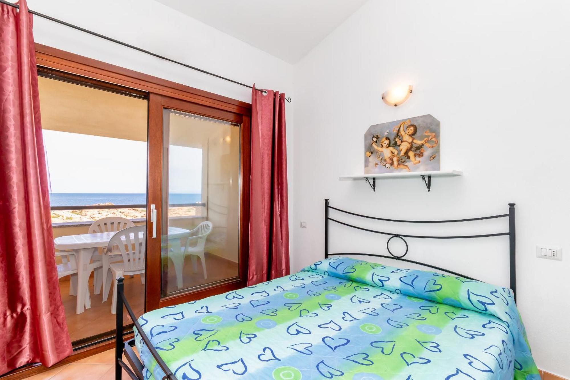 Casa Sulla Scogliera Isola Rossa Apartment ภายนอก รูปภาพ