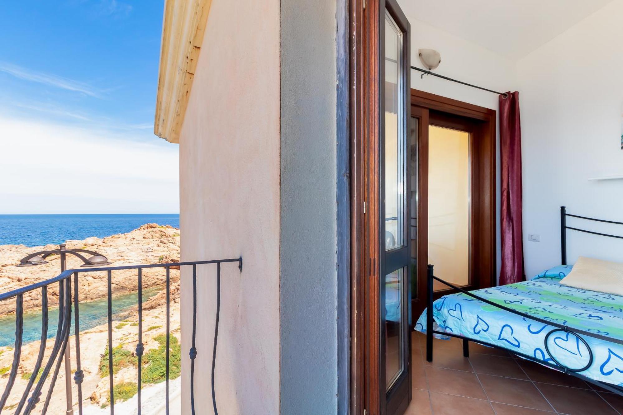 Casa Sulla Scogliera Isola Rossa Apartment ภายนอก รูปภาพ