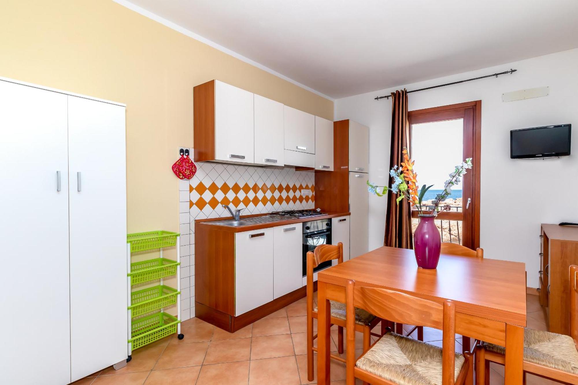 Casa Sulla Scogliera Isola Rossa Apartment ภายนอก รูปภาพ